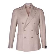 Herre blazer. Dobbeltbrystet model med peak revers. Regular fit. Påsat...