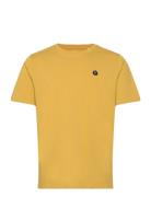 Loke Badge T-Shirt - Regenerative O Tops T-Kortærmet Skjorte Yellow Kn...