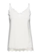 Top From Freequent In A Light Material. The Top Has A Simple Silhouett...