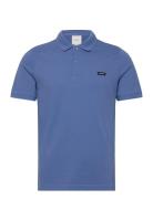 Stretch Pique Slim Button Polo Tops Polos Short-sleeved Blue Calvin Kl...