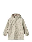 Rainwear Ollo Jacket Outerwear Rainwear Jackets Cream Wheat