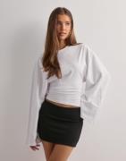Nelly - Sort - Low Waist Mini Skirt